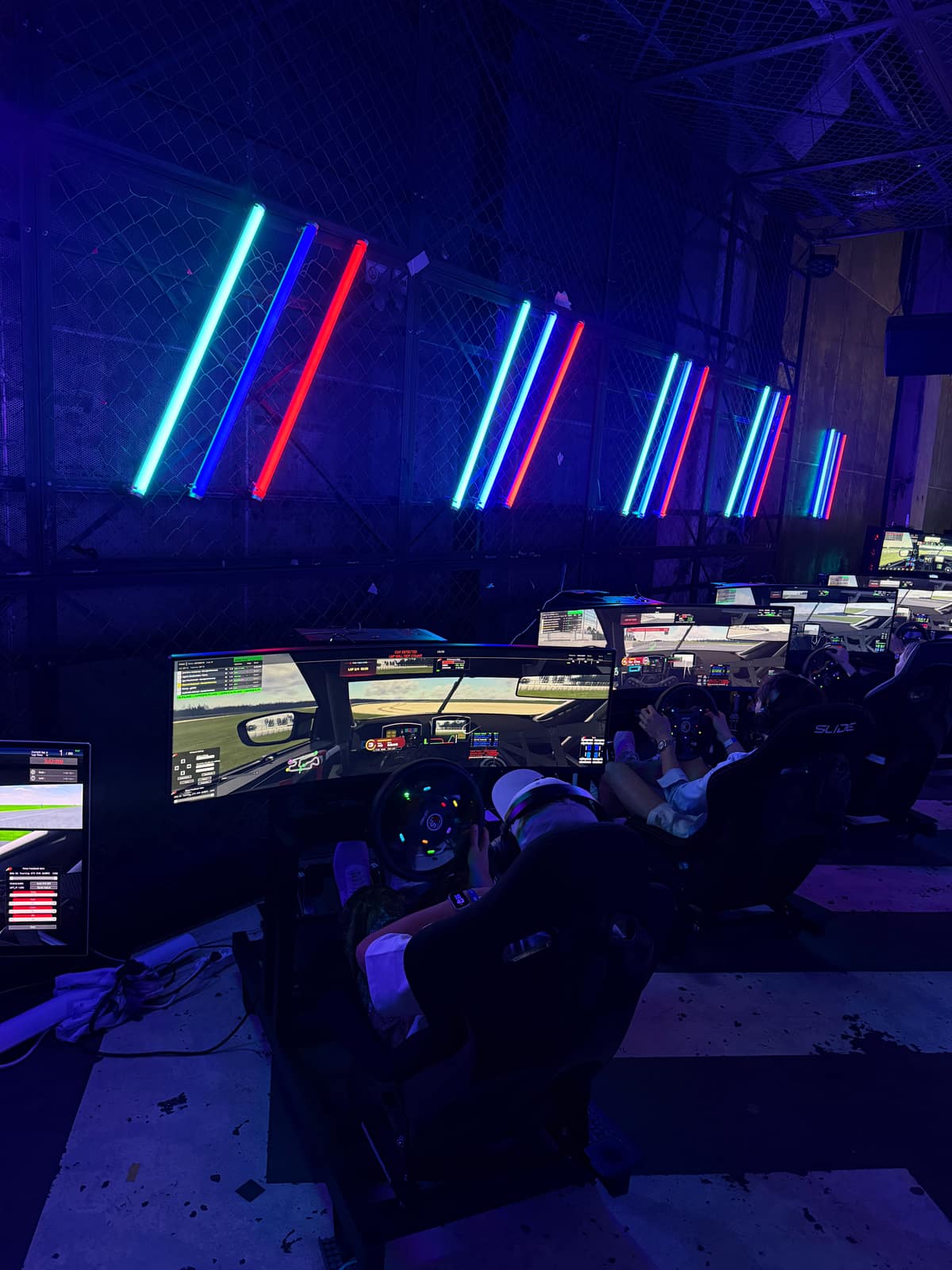 A driver mid-session with the racing view filling the ultrawide screen